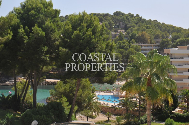 Property for Sale in 2 bedroom, 2 bathroom beachfront penthouse with sea view and parking for sale Cala Vinyes, Mallorca, Spain